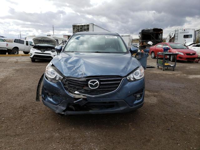 Photo 5 from auction – 2016 MAZDA CX-5 TOURI with VIN JM3KE2CY8G0902095