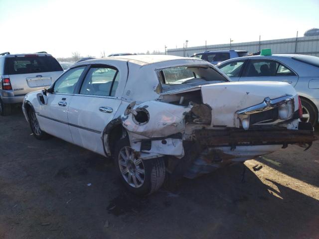 Photo 2 from auction – 2000 LINCOLN TOWN CAR E with VIN 1LNHM81W2YY864047