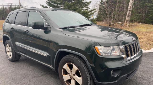 JEEP GRAND CHER 2011 with VIN 1J4RR4GG5BC561152 - Photo from auction
