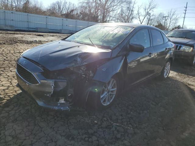 FORD FOCUS SE 2018 with VIN 1FADP3F2XJL214510 - Photo from auction