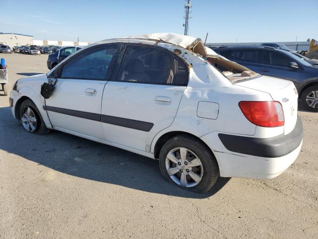 Photo 2 from auction – 2009 KIA RIO BASE with VIN KNADE223596496099
