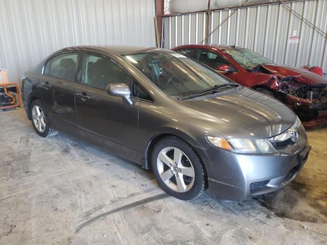 Photo 4 from auction – 2011 HONDA CIVIC LX-S with VIN 19XFA1F6XBE009419