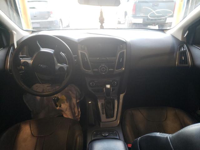 Photo 8 from auction – 2014 FORD FOCUS TITA with VIN 1FADP3J2XEL292623