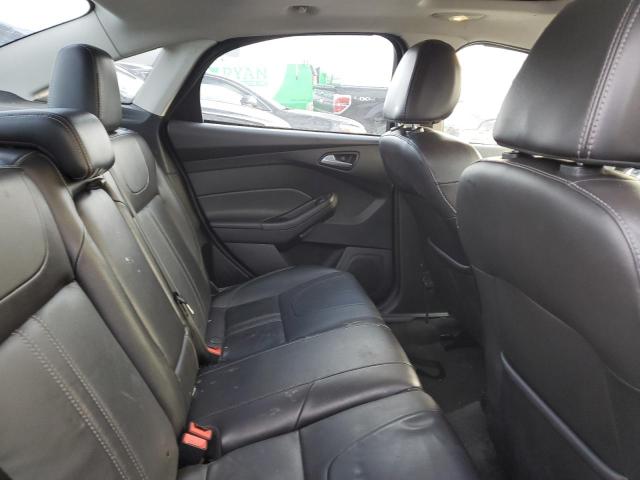 Photo 10 from auction – 2014 FORD FOCUS SE with VIN 1FADP3F27EL370722