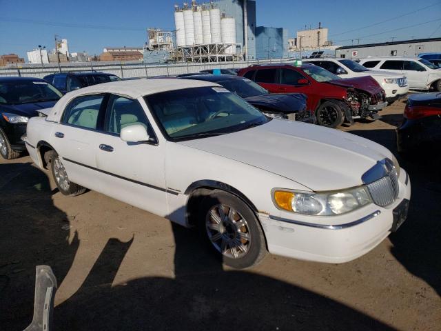 Photo 4 from auction – 2000 LINCOLN TOWN CAR E with VIN 1LNHM81W2YY864047