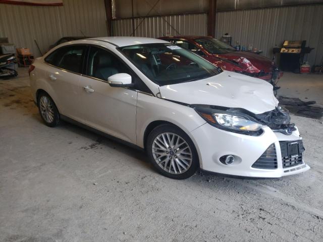 Photo 4 from auction – 2014 FORD FOCUS TITA with VIN 1FADP3J2XEL292623