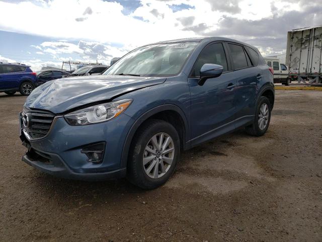 MAZDA CX-5 TOURI 2016 with VIN JM3KE2CY8G0902095 - Photo from auction