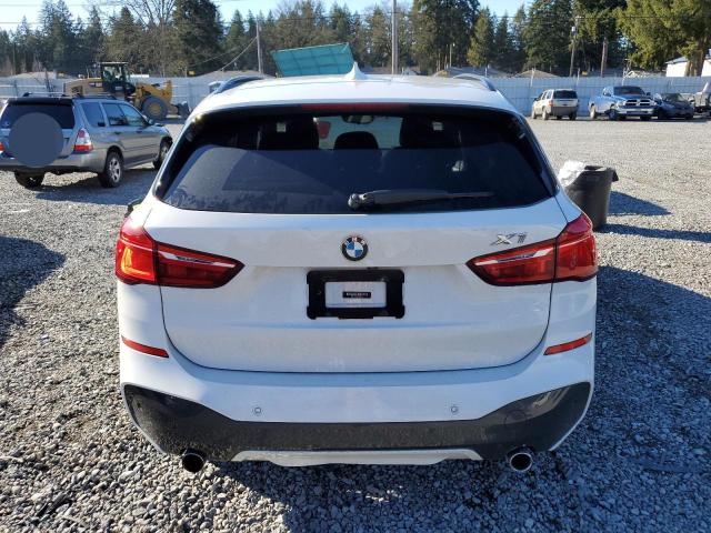 Photo 6 from auction – 2017 BMW X1 XDRIVE2 with VIN WBXHT3C34H5F70315