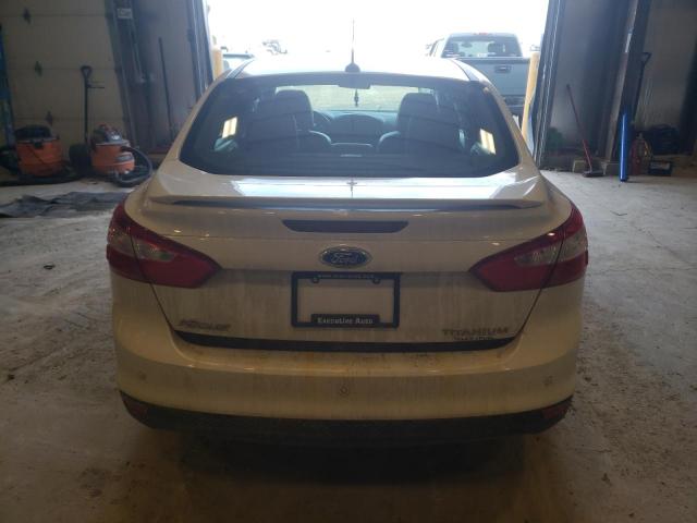 Photo 6 from auction – 2014 FORD FOCUS TITA with VIN 1FADP3J2XEL292623