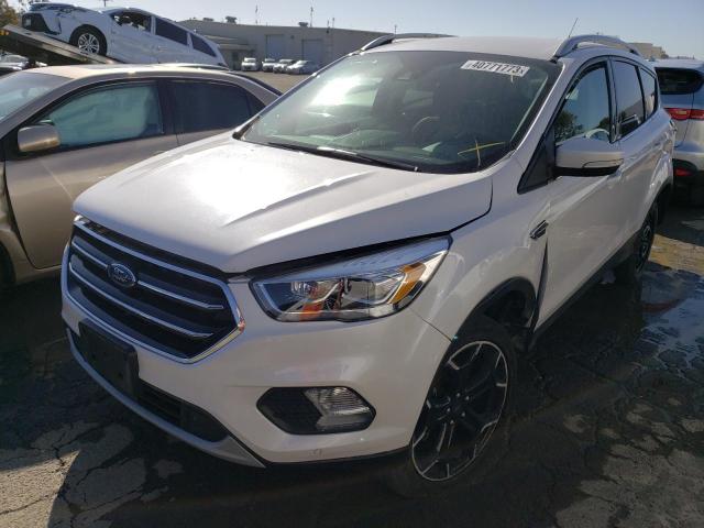 FORD ESCAPE TIT 2018 with VIN 1FMCU9J94JUD05655 - Photo from auction