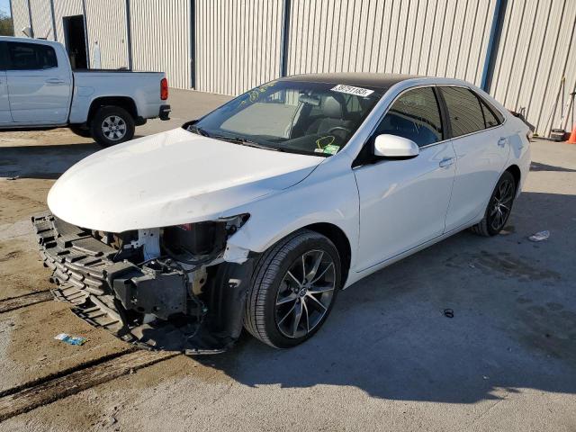 TOYOTA CAMRY LE 2015 with VIN 4T1BF1FK0FU077082 - Photo from auction