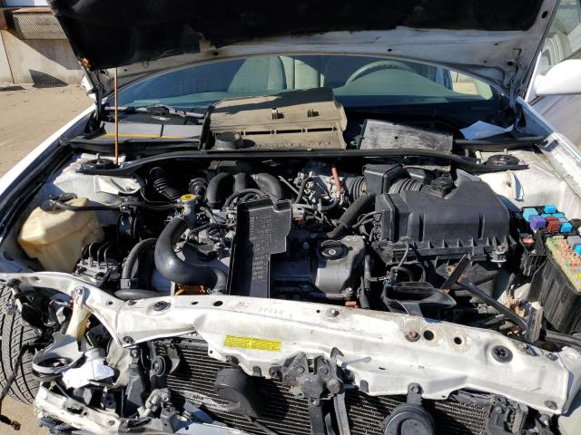 Photo 11 from auction – 2004 TOYOTA CAMRY LE with VIN 4T1BF30K44U075109