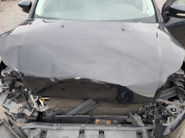 Photo 11 from auction – 2014 FORD FOCUS SE with VIN 1FADP3F22EL308953