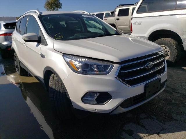 Photo 4 from auction – 2018 FORD ESCAPE TIT with VIN 1FMCU9J94JUD05655