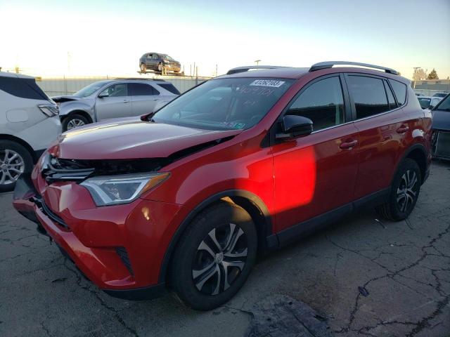 TOYOTA RAV4 LE 2016 with VIN 2T3BFREV5GW409701 - Photo from auction