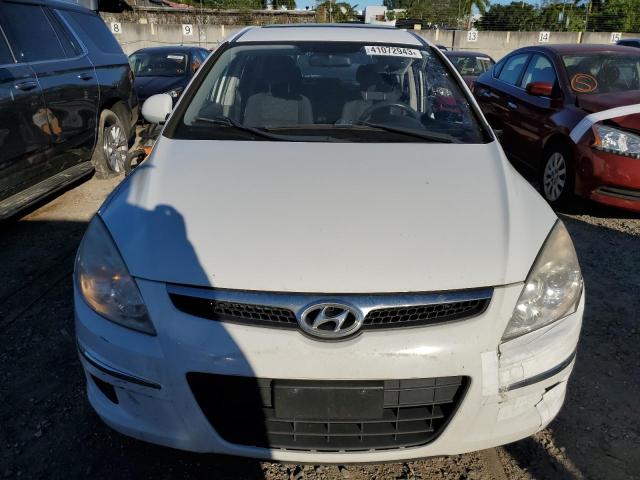Photo 5 from auction – 2011 HYUNDAI ELANTRA TO with VIN KMHDB8AE5BU091004