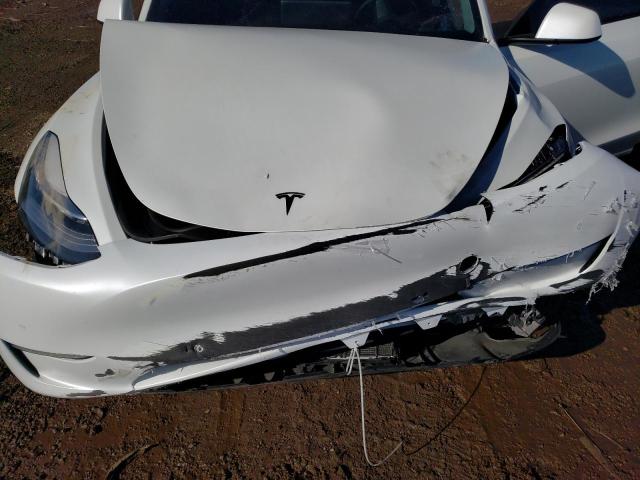 Photo 11 from auction – 2022 TESLA MODEL Y with VIN 7SAYGDEE5NF343862
