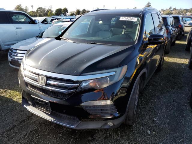 HONDA PILOT TOUR 2016 with VIN 5FNYF5H95GB002825 - Photo from auction