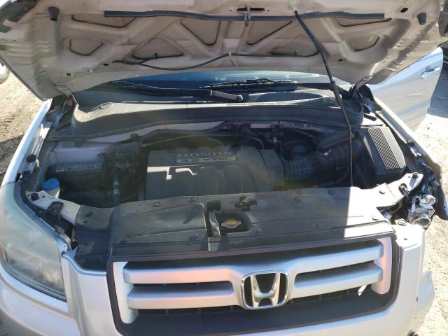 Photo 12 from auction – 2006 HONDA PILOT EX with VIN 2HKYF186X6H560717