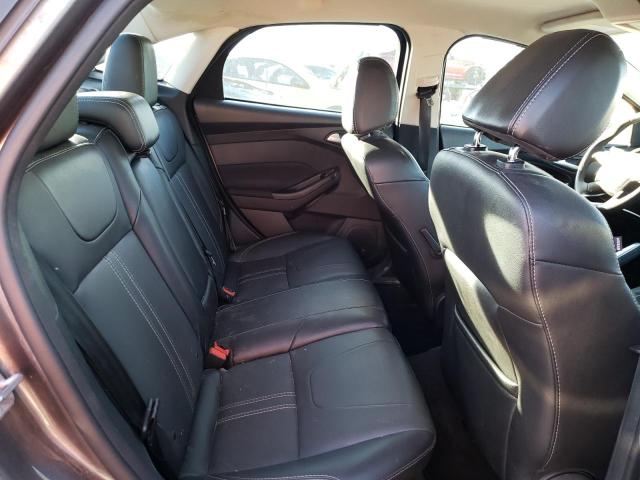 Photo 10 from auction – 2014 FORD FOCUS TITA with VIN 1FADP3J23EL115153
