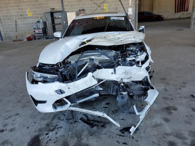 Photo 5 from auction – 2020 BMW 330I with VIN 3MW5R1J00L8B11056