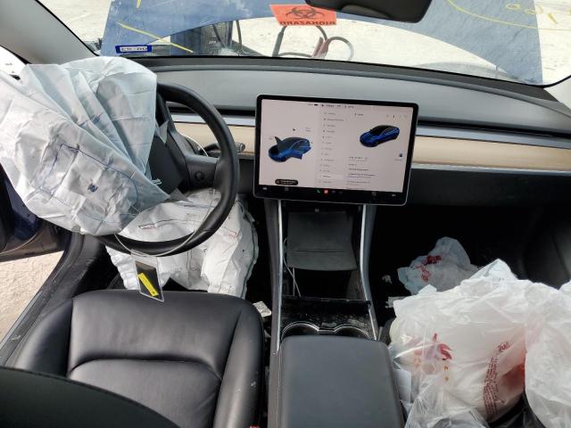 Photo 8 from auction – 2018 TESLA MODEL 3 with VIN 5YJ3E1EA2JF034157