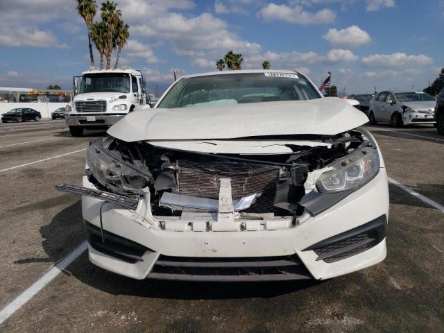 Photo 5 from auction – 2018 HONDA CIVIC EX with VIN 19XFC2F7XJE206579
