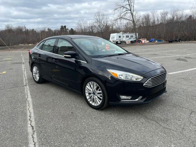 FORD FOCUS TITA 2015 with VIN 1FADP3J2XFL213047 - Photo from auction