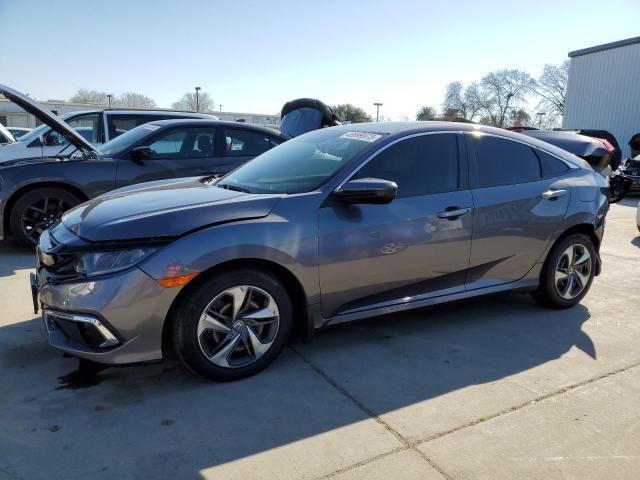 HONDA CIVIC LX 2019 with VIN 19XFC2F62KE214717 - Photo from auction