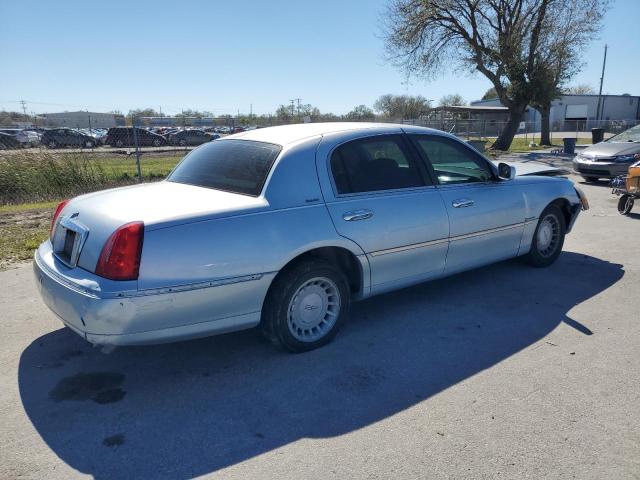 Photo 3 from auction – 1998 LINCOLN TOWN CAR E with VIN 1LNFM81W9WY630699