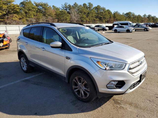 Photo 4 from auction – 2017 FORD ESCAPE SE with VIN 1FMCU9GD4HUD70950