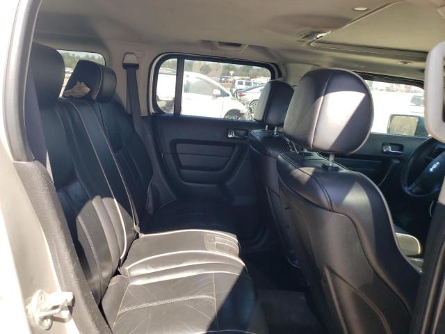 Photo 11 from auction – 2007 HUMMER H3 with VIN 5GTDN13E978149043
