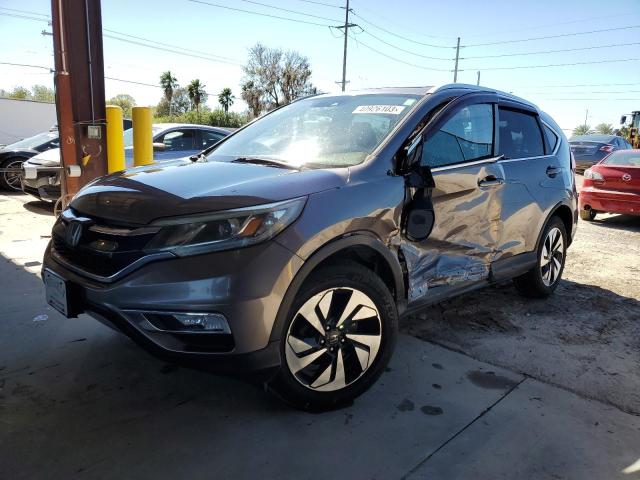 Photo 1 from auction – 2015 HONDA CR-V TOURI with VIN 5J6RM4H97FL131482