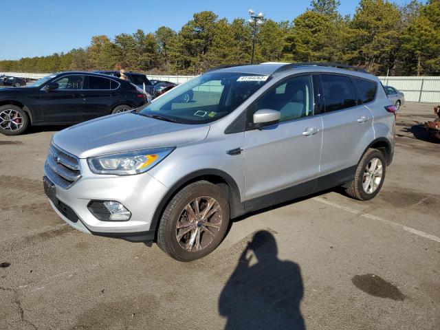 FORD ESCAPE SE 2017 with VIN 1FMCU9GD4HUD70950 - Photo from auction