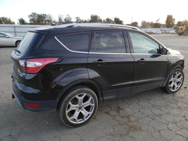 Photo 3 from auction – 2017 FORD ESCAPE TIT with VIN 1FMCU9J9XHUD29310