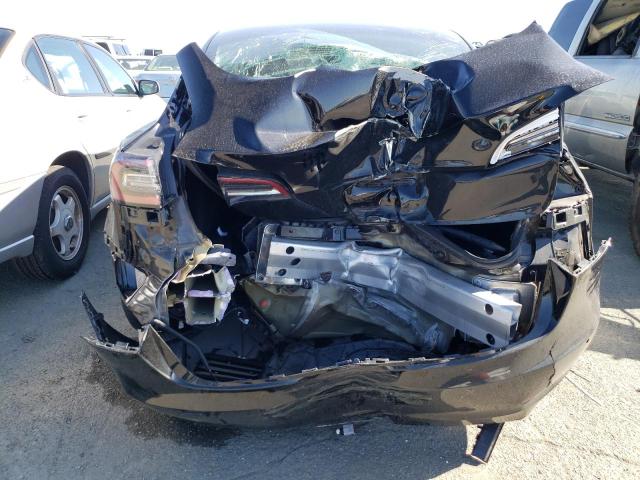 Photo 6 from auction – 2022 TESLA MODEL 3 with VIN 5YJ3E1EA8NF186272