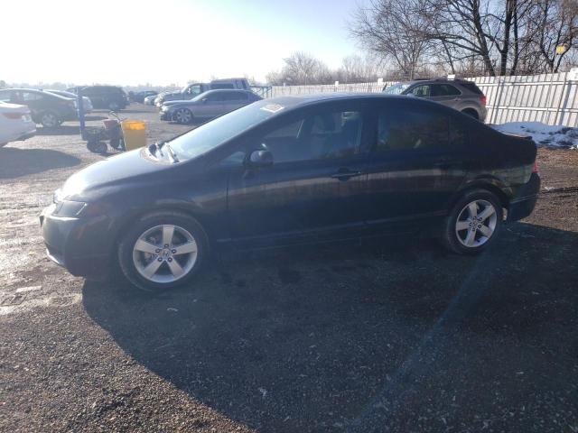 HONDA CIVIC LX-S 2010 with VIN 2HGFA1E65AH010872 - Photo from auction