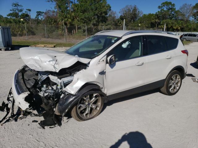 FORD ESCAPE TIT 2015 with VIN 1FMCU9J9XFUC45033 - Photo from auction