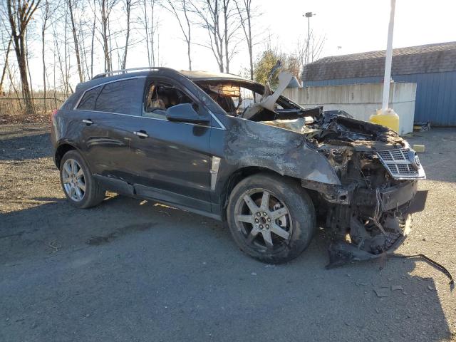 Photo 4 from auction – 2011 CADILLAC SRX PREMIU with VIN 3GYFNFEYXBS644558