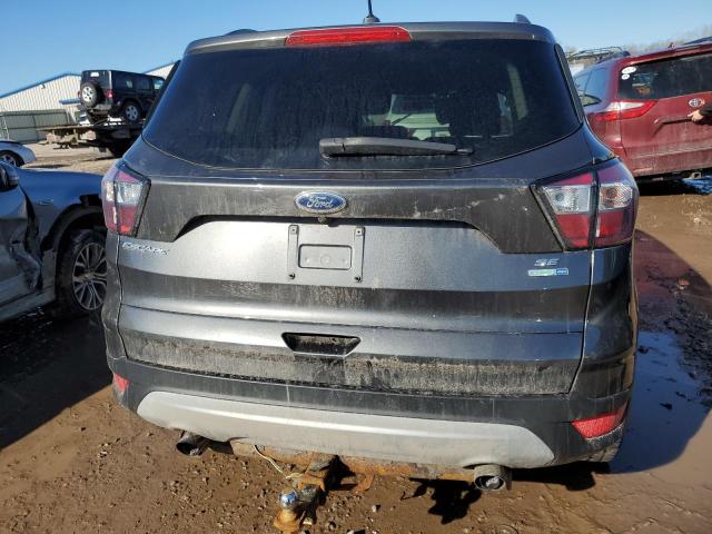Photo 6 from auction – 2018 FORD ESCAPE SE with VIN 1FMCU9GD5JUC29696