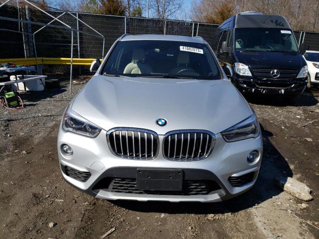 Photo 5 from auction – 2018 BMW X1 XDRIVE2 with VIN WBXHT3C39J5L25772