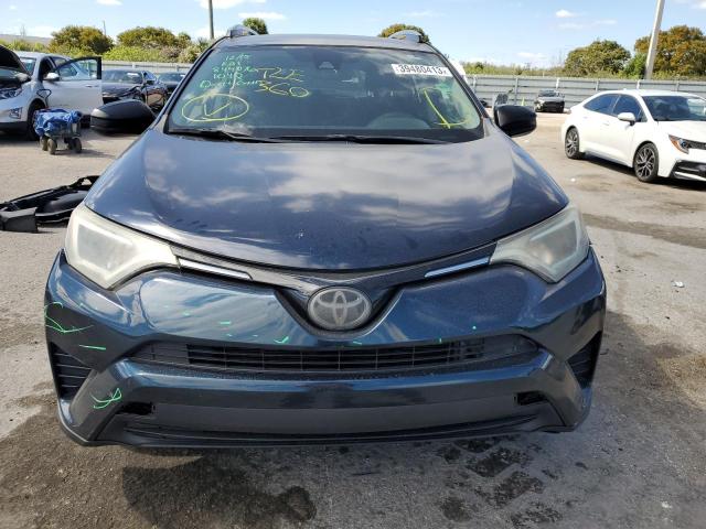 Photo 5 from auction – 2017 TOYOTA RAV4 LE with VIN 2T3ZFREV5HW318797