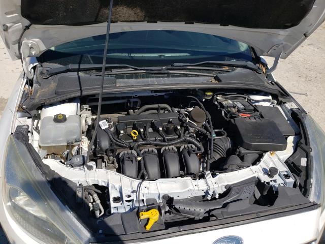 Foto 11 de la subasta – 2015 FORD FOCUS SE con VIN 1FADP3K24FL295954