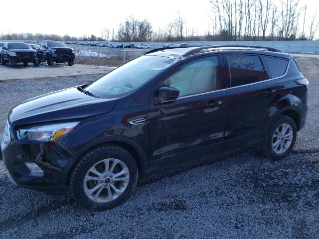 FORD ESCAPE SE 2018 with VIN 1FMCU9GD8JUD25337 - Photo from auction