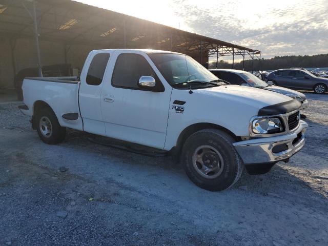 Photo 4 from auction – 2002 FORD F150 with VIN 1FTRX07L42KB73529