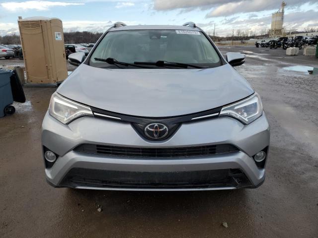 Photo 5 from auction – 2018 TOYOTA RAV4 LIMIT with VIN JTMDFREV4JD230370