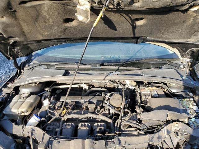 Photo 11 from auction – 2014 FORD FOCUS SE with VIN 1FADP3F21EL135913