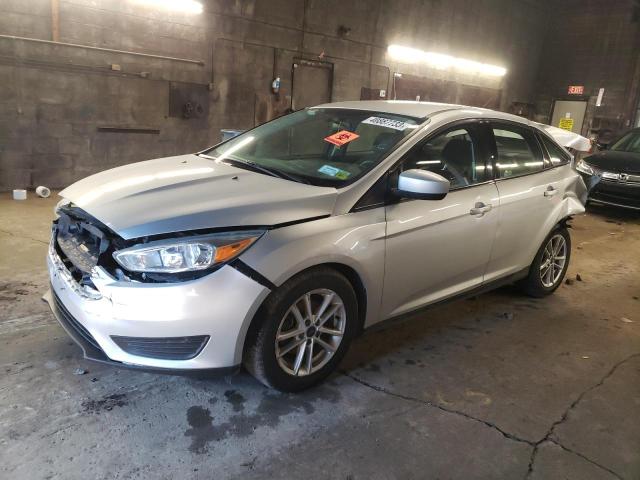 FORD FOCUS SE 2018 with VIN 1FADP3FE4JL202962 - Photo from auction