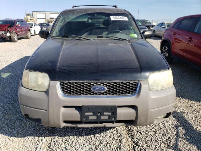 Photo 5 from auction – 2002 FORD ESCAPE with VIN 1FMYU04132KB23451