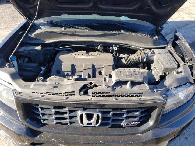 Photo 11 from auction – 2014 HONDA RIDGELINE with VIN 5FPYK1F70EB014939